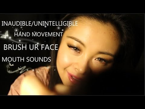 brush your face with Inaudible/unintelligible whisper + hand movements
