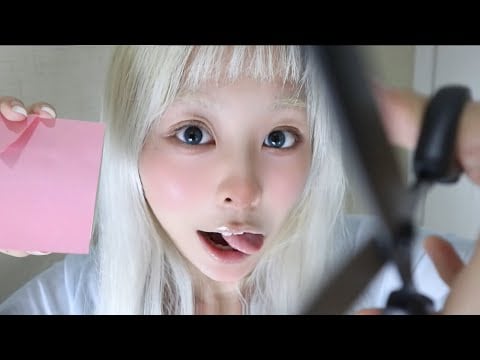 ASMR mouth sounds + paper-cutting so close to ears