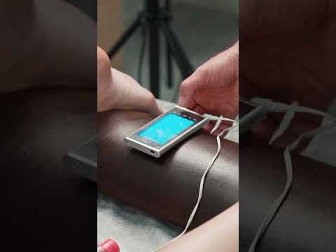 Unique myostimulation to treat Lisa's back #backpain