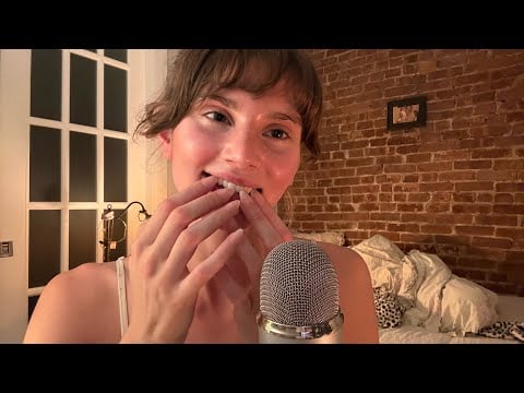 ASMR teeth tapping, inaudible whispers, mouth sounds, mic scratching, and more