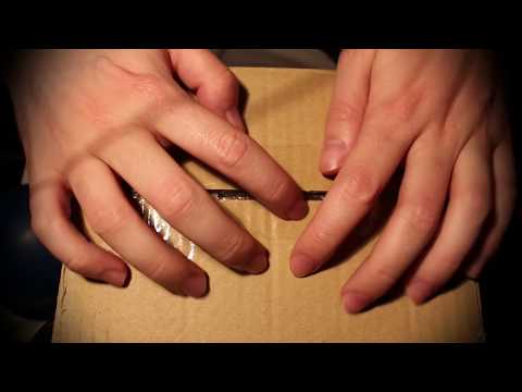 ASMR une boite dans du papier bulle dans un carton
