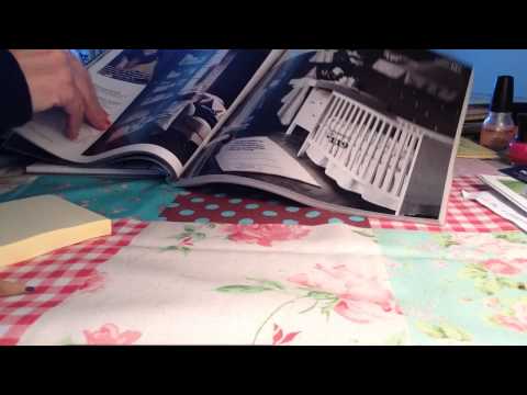 ASMR quiet page flip through IKEA catalog; no talking