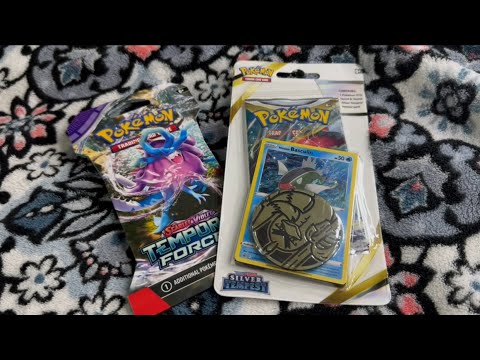 ASMR opening packs of pokémon 💞￼ (whispers and card shuffling)￼