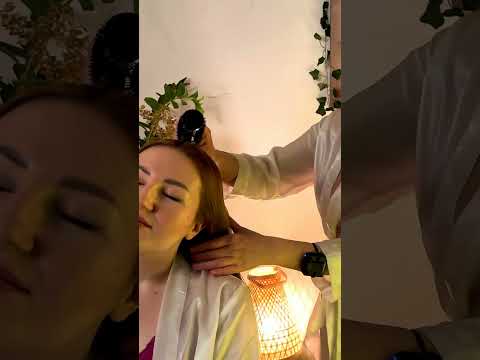 Mira and Veronica work in harmony, tracing gentle circles through the Client's hair as warm oil pool