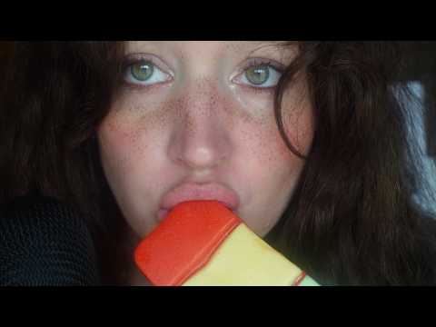 eating giant gummy, no talking (intense eating and mouth sounds, close-up)