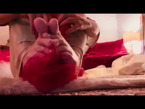 ASMR bare feet with red tissue between