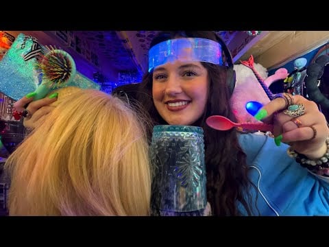Cup w/ mermaid, plastic spoon, hair brushing, finger lights, tapping, mouth sounds, peanut, etc