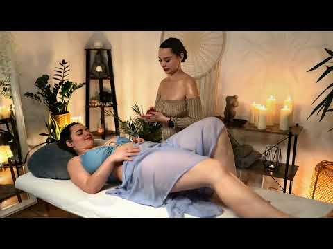 Veronica smooths warm oil over the Client's back, her hands pressing into tense muscles as she works