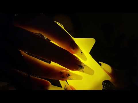 *one minute asmr* fast tapping on spooky trinkets (no talking)