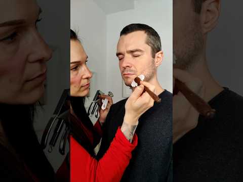 Fixing his broken face
