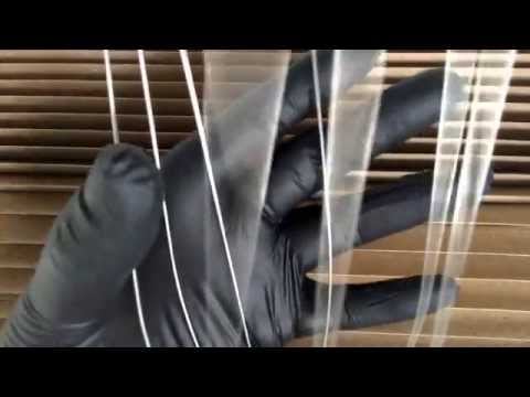 Latex gloves touching harmonica pleated cardboard [[ASMR]]