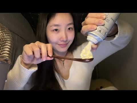 Wooden spoon eats cream