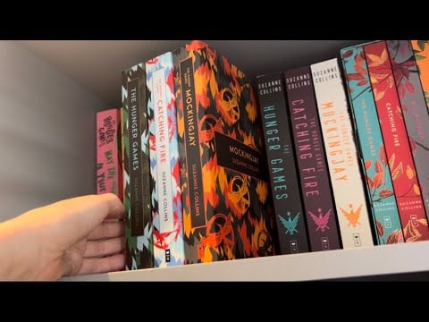 ASMR Book Shelf Tour (Hunger Games edition) (book triggers and close whispers) 