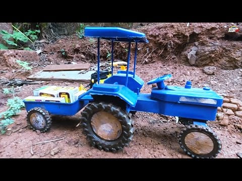 mini Swaraj tractor stuck in mud jcb Loading matchboxes help tractor Video mud toys