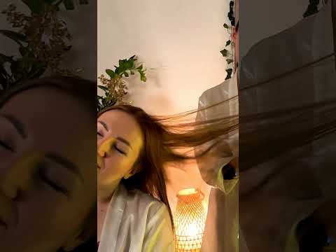 Mira and Veronica work in harmony, tracing gentle circles through the Client's hair as warm oil pool