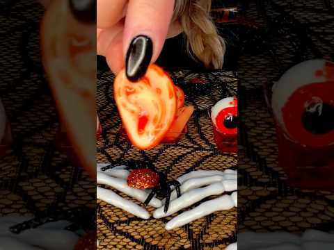 Candy ear with 🩸#asmr #candy #halloween #fallintoshorts #food