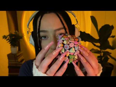*one minute asmr* candy mic tapping & scratching (no talking)
