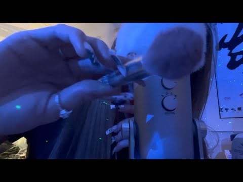 Doing your makeup ASMR face tapping, visuals, up close whispers. 