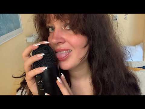 mouth sounds on the mic, no talking (cupped mouth sounds, wet mouth sounds)