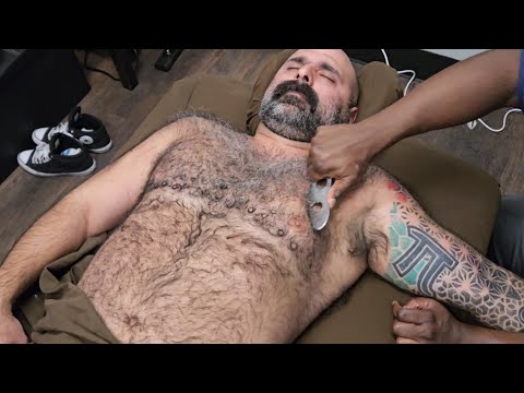 Massaging a Hairy Man's Chest