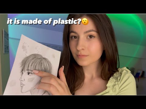 Asmr tapping on drawn plastic face