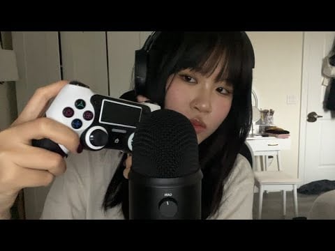 ASMR random triggers \\ whispers , tapping , mouth sounds , controller sounds , crinkles