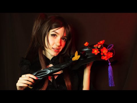 ASMR video of Hu Tao cosplay from the game Genshin Impact