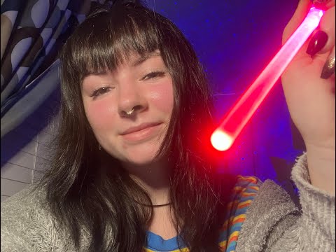 asmr light triggers (little lightsaber chopsticks!) with rain in the background