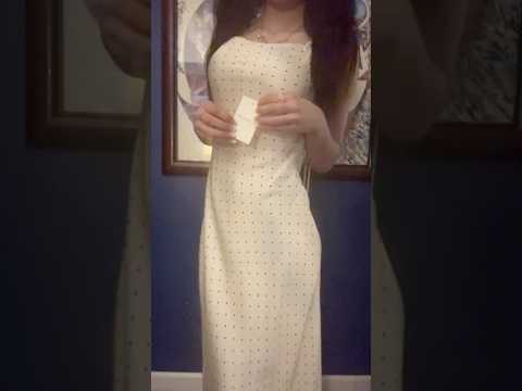 Ivory midi slip dress with black polka dots.