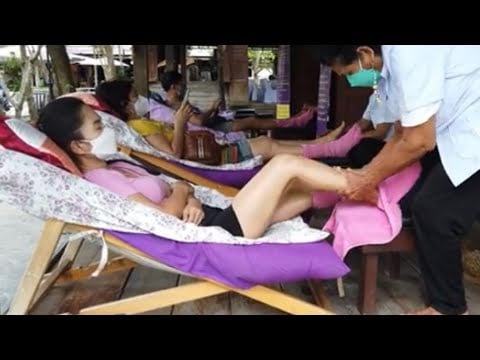THAI STREET MASSAGE / FOOT Reflexology with stick by grandma in Thai village
