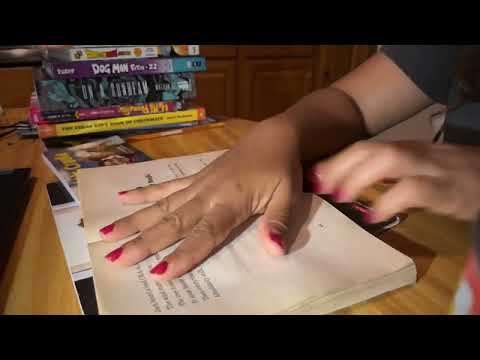 ASMR asmr sound of turning book pages.