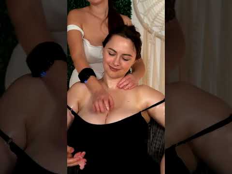 Watch as Mira and Scarlet Sin focus on back massage techniques, their hands tracing gentle circles t