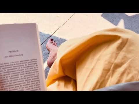 ASMR reading barefoot on busy sidewalk