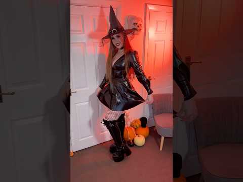 Rate my Latex Witch Cosplay out of 10?🧙‍♀️🖤✨#latex #cosplay #halloween #boots #shiny #fyp #dress
