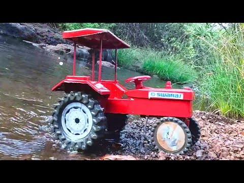 mini Swaraj tractor stuck in mud jcb Loading parle g help tractor Video mud toy