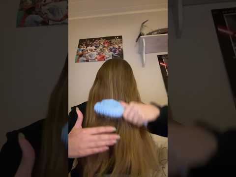 ASMR brushing hair over face