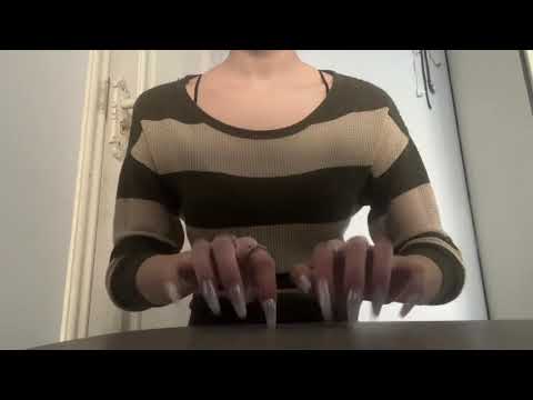 Long nails quickly scratching a leather chair ASMR quick scratching