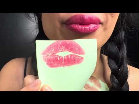 Loud squeaky kisses on paper ASMR