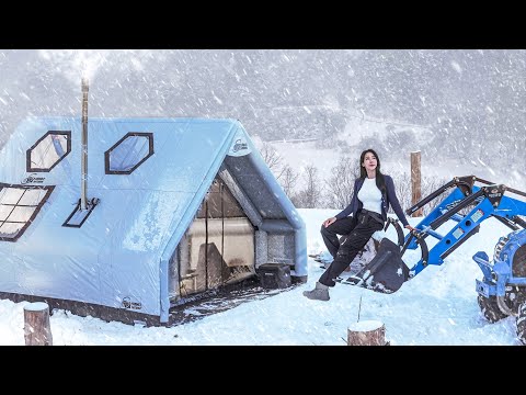 CAMPING IN HEAVY SNOW WITH A TRACTOR IN A NEW INFLATABLE TENT