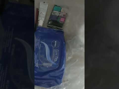 asmr putting stuff into a bag