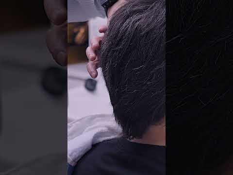 Barber Consults Client  Is the Back Short Enough