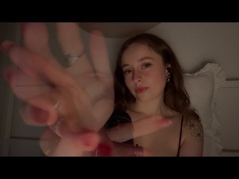 ASMR mesmerizing hand movements with trigger words and echoed mouth sounds