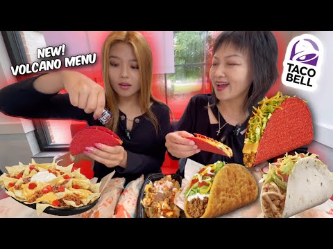 TRYING NEW TACO BELL VOLCANO MENU + LAVA SAUCE! VOLCANO TACO, BURRITO, NACHOS, CRISPY CHICKEN TACO