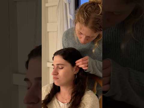 Delicately tucking her hair behind her ear #asmr