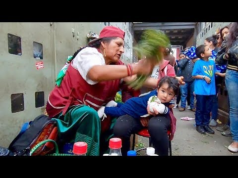 Doña Rosa does energy cleansing (limpia espiritual) in Cuenca, Ecuador