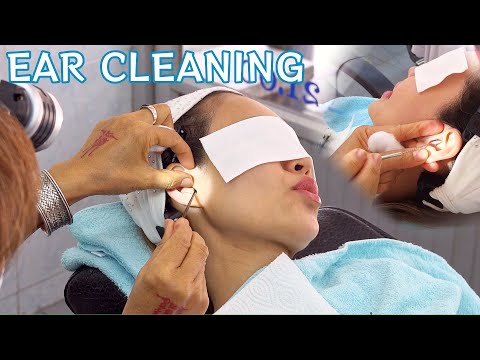 $3 Ear Cleaning at local Thai barber shop | ASMR (unintentional,  street noises, people chat)