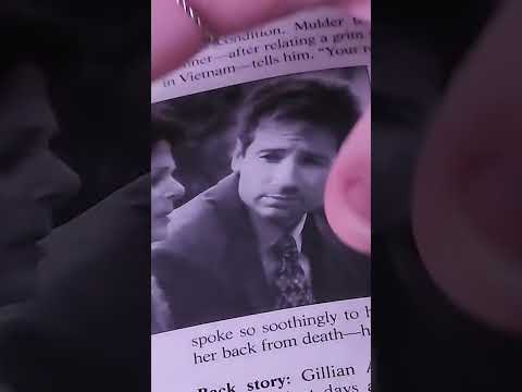 Tapping on this X-FIles guidebook 👽💤