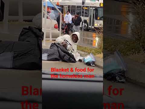 GIVE FOOD AND BLANKET TO THE HOMELESS MAN