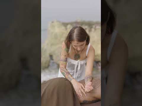Back massage on the beach