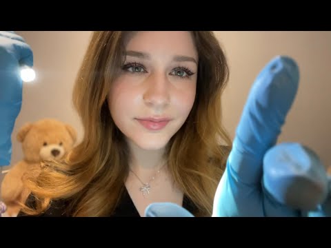 ASMR inspecting your face 🧐 whispering, gloves, flashlight